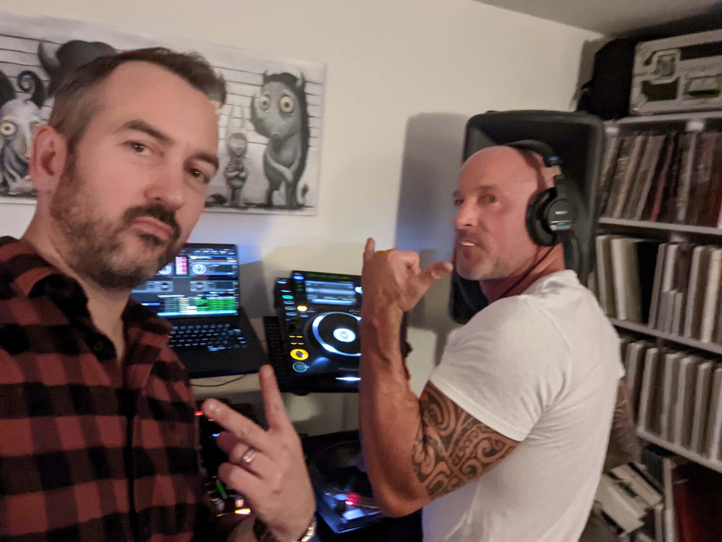 Seattle skyline behind DJ performing at an outdoor venue at sunset