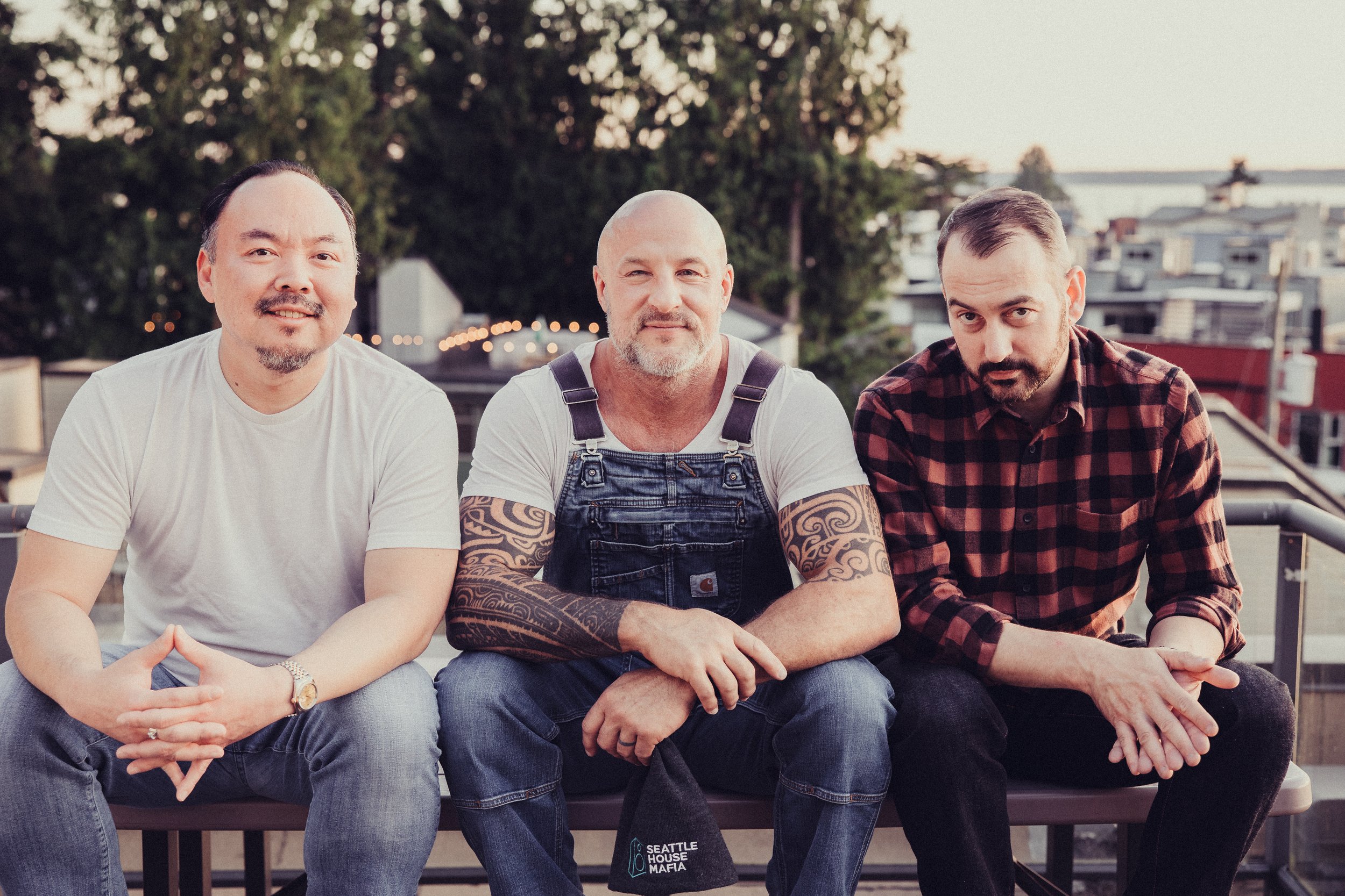DJ performing in a nightclub with colorful LED lighting and disco ball