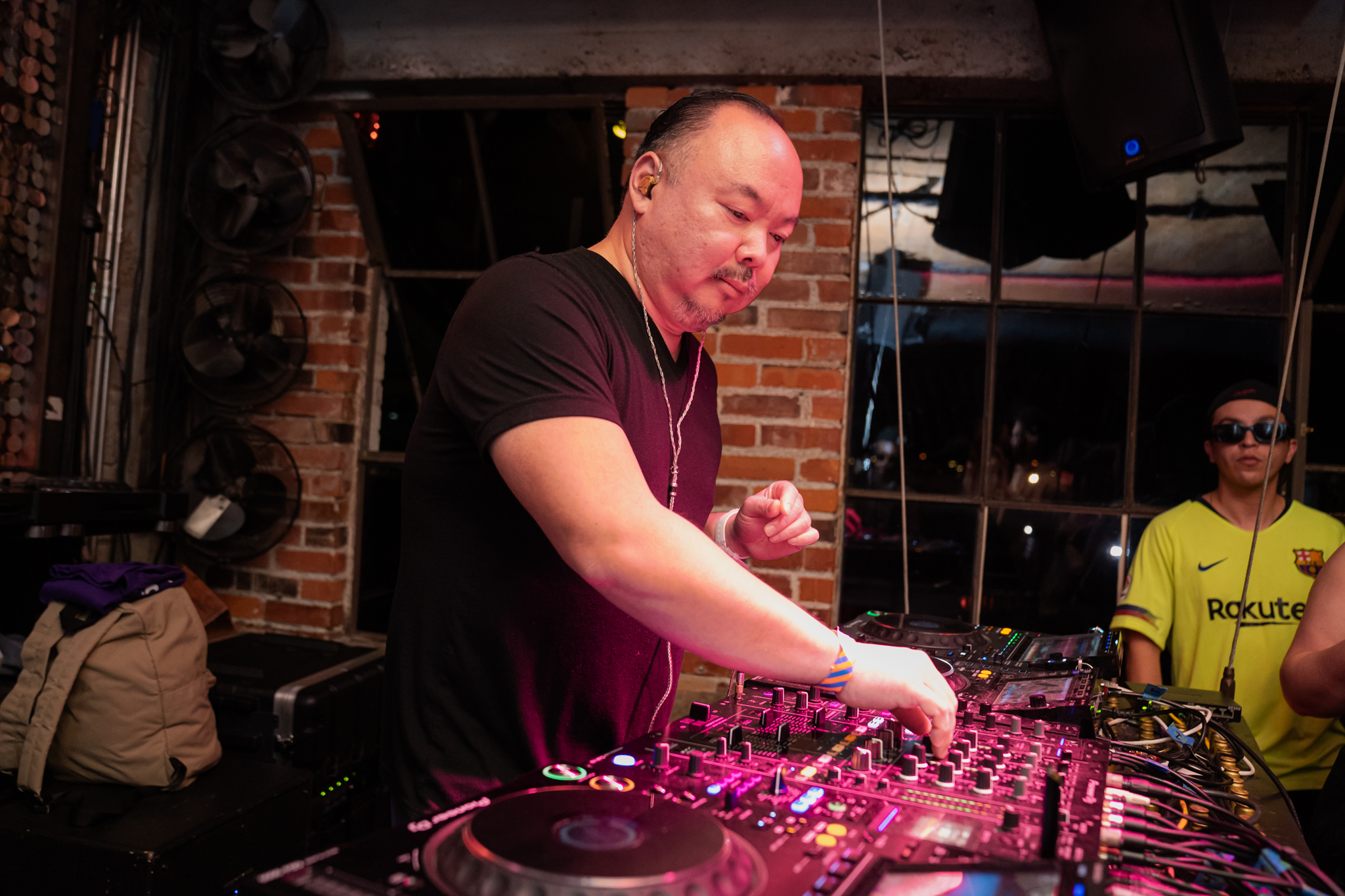 DJ Sang-Do adjusting the EQ of his mix